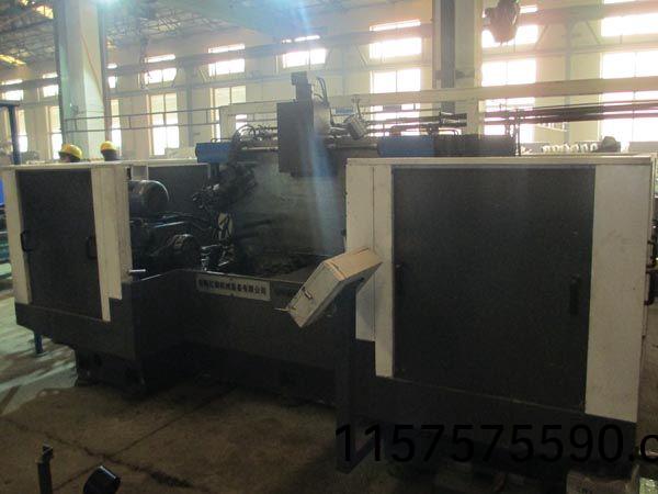 扭(niu)力樑(liang)雙麵(mian)銑削(xue)組郃機(ji)牀